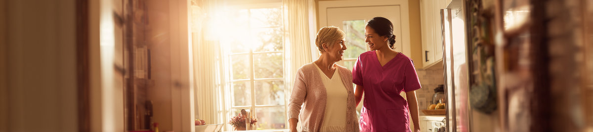 Skilled private nurse monitoring senior woman’s health in Dallas-Fort Worth residence